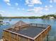 Beautiful lake view from a dock, perfect for boating and enjoying scenic water views at 126 Balmoral Dr, Mooresville, NC 28117
