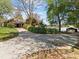 Private drive leading to a waterfront home with mature trees and landscaping at 126 Balmoral Dr, Mooresville, NC 28117