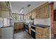 Kitchen featuring custom wood cabinets and stainless steel appliances at 126 Balmoral Dr, Mooresville, NC 28117