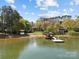 Scenic waterfront homes with a private dock, and a sandy beach offering a perfect blend of luxury and nature at 126 Balmoral Dr, Mooresville, NC 28117