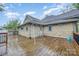 Exterior view of the back deck featuring natural wood and railings at 128 Allenton St, Norwood, NC 28128