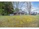 Charming home featuring a covered front porch with detailed supports, offering a cozy and inviting curb appeal at 128 Allenton St, Norwood, NC 28128