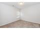 Cozy bedroom with carpet flooring and a window, offering a comfortable and inviting space at 1415 Troon Dr, Salisbury, NC 28144