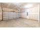 Spacious two-car garage with ample storage and easy access for vehicles and projects at 1415 Troon Dr, Salisbury, NC 28144