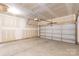 Spacious unfinished two-car garage with new garage door and updated garage door opening system at 1415 Troon Dr, Salisbury, NC 28144
