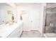 Stylish bathroom featuring double sinks, a walk-in shower, and modern finishes at 154 Rooster Tail Ln, Troutman, NC 28166