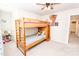 Well-lit bedroom featuring bunk beds and decor, perfect for  at 154 Rooster Tail Ln, Troutman, NC 28166