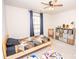 Cozy bedroom with a ceiling fan, and window providing natural light at 154 Rooster Tail Ln, Troutman, NC 28166