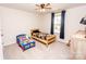 Bright bedroom with twin beds and plenty of natural light from window at 154 Rooster Tail Ln, Troutman, NC 28166