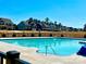 A large community pool offers a refreshing escape, surrounded by well-maintained landscaping and charming neighborhood homes at 154 Rooster Tail Ln, Troutman, NC 28166