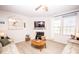 Comfortable living room with neutral decor, a fireplace, and ample seating, perfect for gatherings and relaxation at 154 Rooster Tail Ln, Troutman, NC 28166