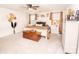 This main bedroom offers neutral decor, a ceiling fan, and lots of natural light at 154 Rooster Tail Ln, Troutman, NC 28166