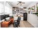 Functional home office featuring a built-in bookcase, desk, and modern workstation, creating a productive workspace at 154 Rooster Tail Ln, Troutman, NC 28166