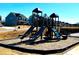 Community playground featuring multiple slides and play areas, great for active  at 154 Rooster Tail Ln, Troutman, NC 28166