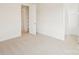 Bedroom with neutral carpet and an open closet and shelving space at 163 Windy Dell Dr, Tega Cay, SC 29708