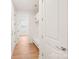 Hallway area with a drop zone, storage, and beautiful wood-look floors at 163 Windy Dell Dr, Tega Cay, SC 29708