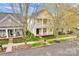 An aerial view showcases the home's position, well-kept yard, and neighborhood setting at 16606 Spruell St, Huntersville, NC 28078