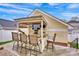 This backyard features a built in bar area with seating and a tv at 16606 Spruell St, Huntersville, NC 28078