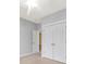 Bedroom with a ceiling fan and double doors at 16606 Spruell St, Huntersville, NC 28078