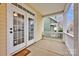 Charming front porch with double doors at 16606 Spruell St, Huntersville, NC 28078
