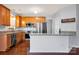 Kitchen with stainless steel appliances, granite countertops, and backsplash at 16606 Spruell St, Huntersville, NC 28078
