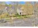 Street view shows charming two-story houses and green lawns along the street, highlighting neighborhood appeal at 16606 Spruell St, Huntersville, NC 28078