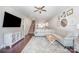 Spacious living area featuring hardwood floors, neutral colors, and an open floor plan at 253 W G St, Kannapolis, NC 28081