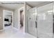 Bright bathroom with a glass-enclosed shower and a view into a main bedroom at 3010 Bramble Hedge Rd # 3271, Indian Trail, NC 28079