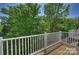 Exterior view from the deck surrounded by lush green trees at 3011 Yada Ln, Charlotte, NC 28208