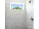 Close-up of a bright shower featuring marble tiles and a modern shower head at 3011 Yada Ln, Charlotte, NC 28208