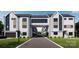 Scenic street view of contemporary townhomes with garages at 3011 Yada Ln, Charlotte, NC 28208
