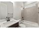 A renovated bathroom with white quartz counters, and modern fixtures at 3050 Tramore Dr, Harrisburg, NC 28075