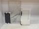 Selection of bathroom materials including hexagon tile, marble tile, and white cabinetry at 3057 Tramore Dr, Harrisburg, NC 28075
