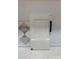 Sample materials showcase a white cabinet door with white countertop and a decorative gray tile at 3057 Tramore Dr, Harrisburg, NC 28075