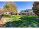 Spacious backyard with lush green grass and a charming porch, perfect for outdoor enjoyment at 315 Muirfield Way, Salisbury, NC 28144