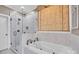 Luxurious bathroom featuring a separate glass shower and a soaking tub at 315 Muirfield Way, Salisbury, NC 28144