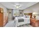 Comfortable bedroom with natural light, ceiling fan, and ample closet space at 315 Muirfield Way, Salisbury, NC 28144
