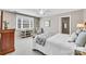 Bright bedroom with a large window, soft carpeting, and neutral color scheme at 315 Muirfield Way, Salisbury, NC 28144
