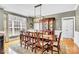 Formal dining room features an elegant chandelier, and plenty of natural light at 315 Muirfield Way, Salisbury, NC 28144