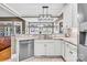 Bright kitchen with granite countertops, stainless steel appliances, and a view to the yard at 315 Muirfield Way, Salisbury, NC 28144