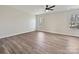 Spacious bedroom features hardwood floors, a ceiling fan, and double windows that offer plenty of natural light at 3201 Decapolis Dr, Charlotte, NC 28215