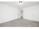 Bright bedroom with plush gray carpeting and ample natural light at 32586 Millingport Rd # 7147, New London, NC 28127