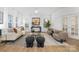 Bright living room with natural light, neutral colors, and modern furnishings at 32586 Millingport Rd # 7147, New London, NC 28127
