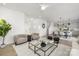 Open-concept living space with a view of the dining area and kitchen, furnished with modern decor at 32586 Millingport Rd # 7147, New London, NC 28127