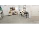 Spacious living room with plush seating, modern desk, and ample natural light at 32586 Millingport Rd # 7147, New London, NC 28127