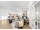 Bright and airy living room with a ceiling fan, modern furniture, and large windows with sheer curtains at 32586 Millingport Rd # 7147, New London, NC 28127