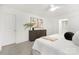 Well-lit main bedroom with modern furnishings and stylish bedside decor at 32586 Millingport Rd # 7147, New London, NC 28127