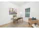 Cozy home office with natural light, stylish desk, and comfortable seating at 32586 Millingport Rd # 7147, New London, NC 28127