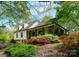 Charming home with inviting front porch and colorful landscaping at 3707 Banyon Nw Ct, Concord, NC 28027