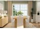 Cozy dining room with natural light, light-colored curtains, and a modern wooden table at 3886 Horsham St, Indian Land, SC 29707